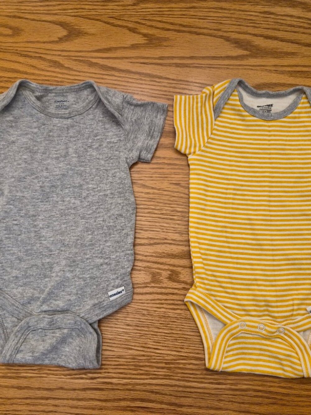 2 Gerber baby onesies 3-6 months